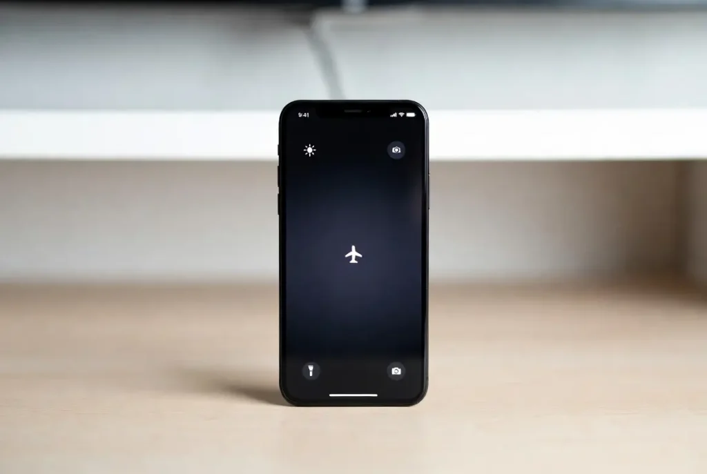 Professional mobile battery saving tips including dark mode and airplane mode